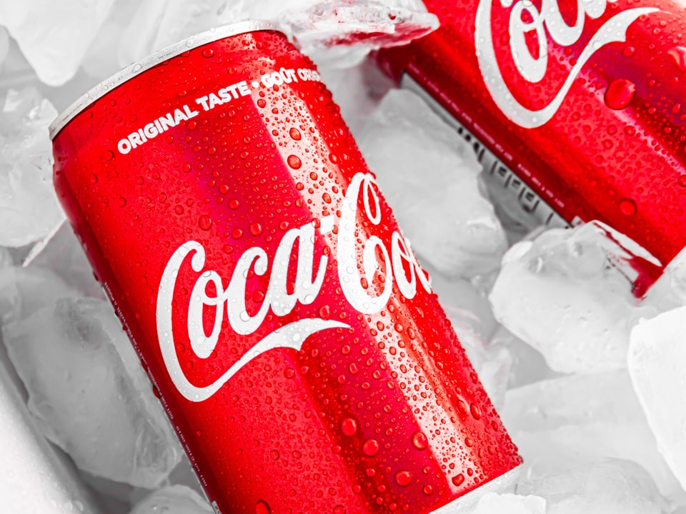 Beverages — Juices, sodas, water, and drinks for the fridge — including flavors popular in Caribbean and African households.