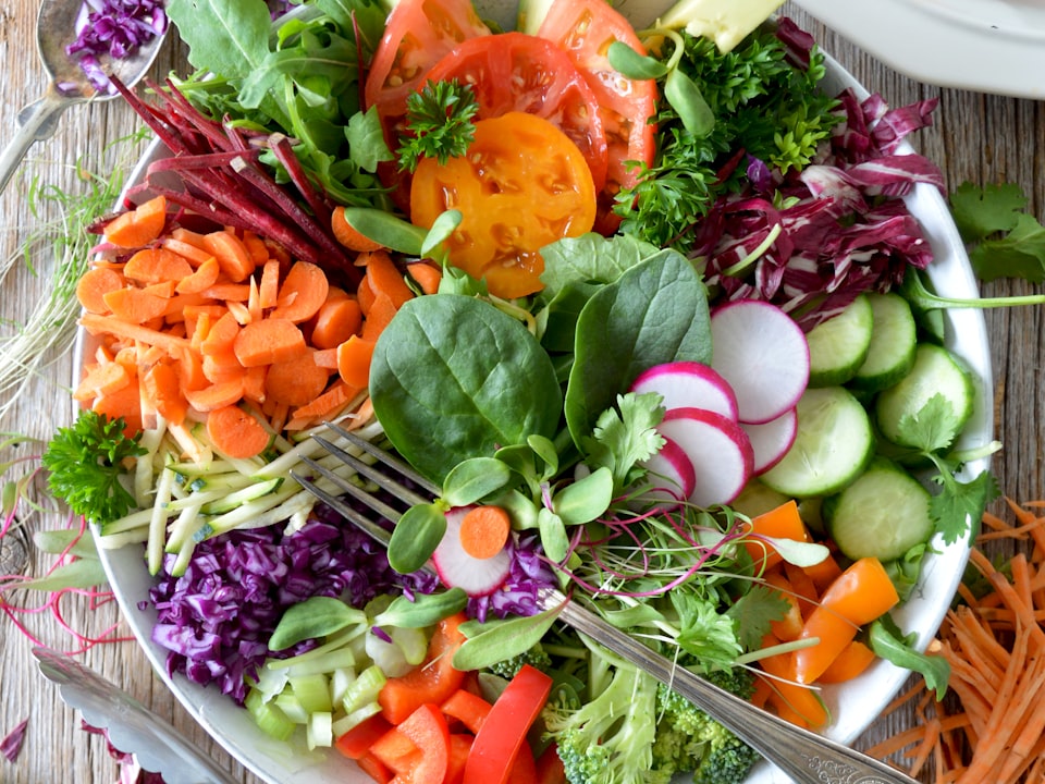 Produce — Tropical and everyday produce for Caribbean and Haitian cooking — plantains, peppers, and fresh vegetables for the week.